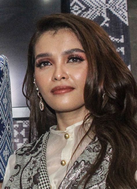 KZ Tandingan .